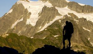 Preview wallpaper silhouette, climber, person, mountains, snow