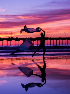 Preview wallpaper silhouette, dance, sea, pier, sunset