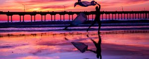 Preview wallpaper silhouette, dance, sea, pier, sunset