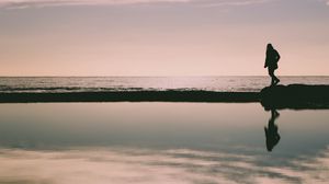 Preview wallpaper silhouette, dark, beach, sea, water