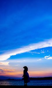 Preview wallpaper silhouette, dark, beach, sea, dusk