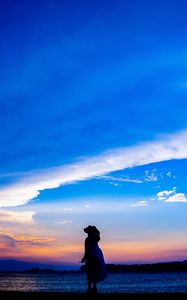 Preview wallpaper silhouette, dark, beach, sea, dusk