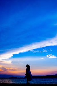 Preview wallpaper silhouette, dark, beach, sea, dusk