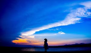 Preview wallpaper silhouette, dark, beach, sea, dusk