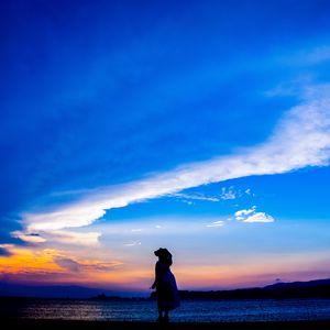 Preview wallpaper silhouette, dark, beach, sea, dusk