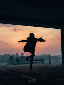 Preview wallpaper silhouette, dark, bounce, twilight, buildings