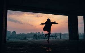 Preview wallpaper silhouette, dark, bounce, twilight, buildings