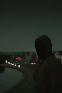 Preview wallpaper silhouette, dark, hood, twilight, gloomy