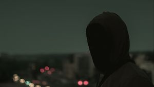 Preview wallpaper silhouette, dark, hood, twilight, gloomy