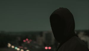 Preview wallpaper silhouette, dark, hood, twilight, gloomy