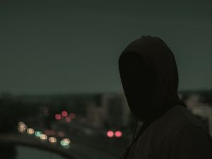 Preview wallpaper silhouette, dark, hood, twilight, gloomy