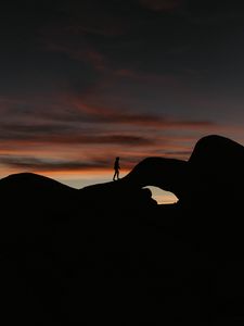 Preview wallpaper silhouette, dark, rocks, twilight, evening