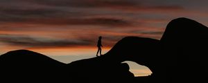 Preview wallpaper silhouette, dark, rocks, twilight, evening