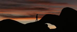 Preview wallpaper silhouette, dark, rocks, twilight, evening