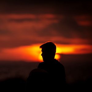 Preview wallpaper silhouette, dark, sunset, twilight, loneliness