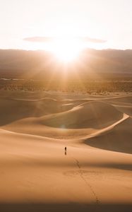Preview wallpaper silhouette, desert, dunes, sand, rays