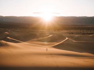Preview wallpaper silhouette, desert, dunes, sand, rays