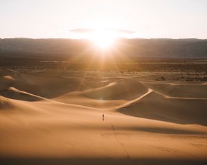 Preview wallpaper silhouette, desert, dunes, sand, rays