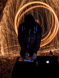 Download wallpaper 240x320 silhouette, dj, light, sparks, long exposure,  dark old mobile, cell phone, smartphone hd background