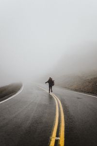 Preview wallpaper silhouette, fog, road, run, lonely, loneliness