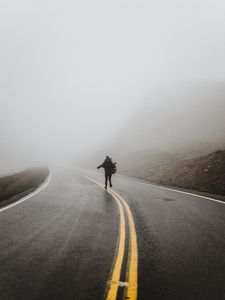 Preview wallpaper silhouette, fog, road, run, lonely, loneliness