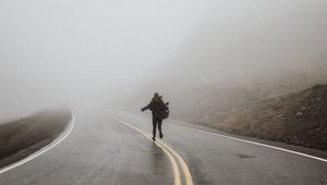 Preview wallpaper silhouette, fog, road, run, lonely, loneliness