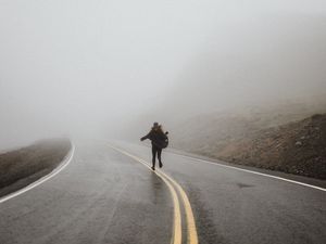 Preview wallpaper silhouette, fog, road, run, lonely, loneliness