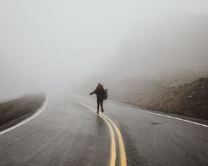 Preview wallpaper silhouette, fog, road, run, lonely, loneliness