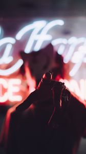 Preview wallpaper silhouette, hand, neon, blur, light