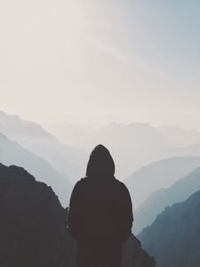 Preview wallpaper silhouette, hood, loneliness, mountains, fog