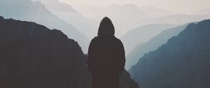 Preview wallpaper silhouette, hood, loneliness, mountains, fog