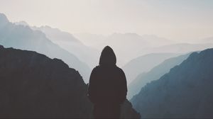 Preview wallpaper silhouette, hood, loneliness, mountains, fog