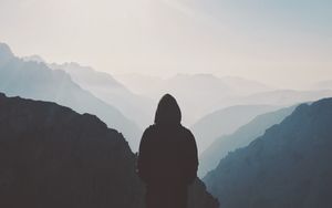 Preview wallpaper silhouette, hood, loneliness, mountains, fog