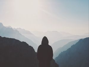 Preview wallpaper silhouette, hood, loneliness, mountains, fog