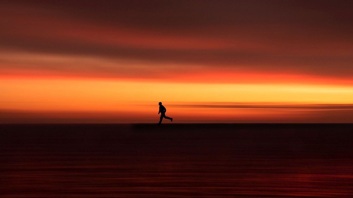 Download wallpaper 1366x768 silhouette, horizon, running, twilight