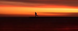 Preview wallpaper silhouette, horizon, running, twilight, sunset, red