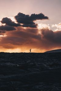 Preview wallpaper silhouette, horizon, volcano, clouds, sunset, kalapana, hawaii