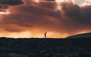 Preview wallpaper silhouette, horizon, volcano, clouds, sunset, kalapana, hawaii