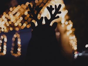 Preview wallpaper silhouette, horns, dark, house, lights, bokeh