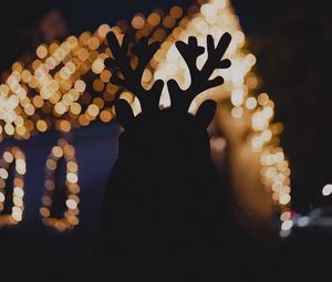 Preview wallpaper silhouette, horns, dark, house, lights, bokeh