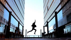 Preview wallpaper silhouette, jump, night, buildings