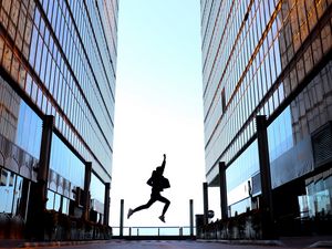 Preview wallpaper silhouette, jump, night, buildings
