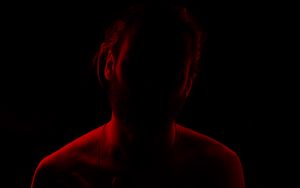 Preview wallpaper silhouette, man, backlight, red, black, dark