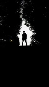 Preview wallpaper silhouette, man, dark, trees