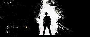 Preview wallpaper silhouette, man, dark, trees