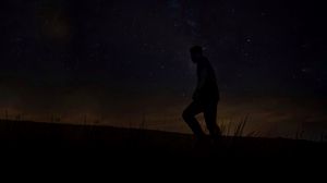 Preview wallpaper silhouette, man, dark, night, starry sky