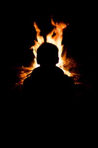 Preview wallpaper silhouette, man, fire, flame, black