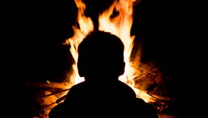 Preview wallpaper silhouette, man, fire, flame, black