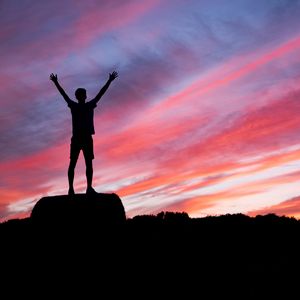 Preview wallpaper silhouette, man, hill, sunset