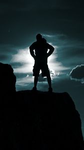 Preview wallpaper silhouette, man, hill, sky, clouds